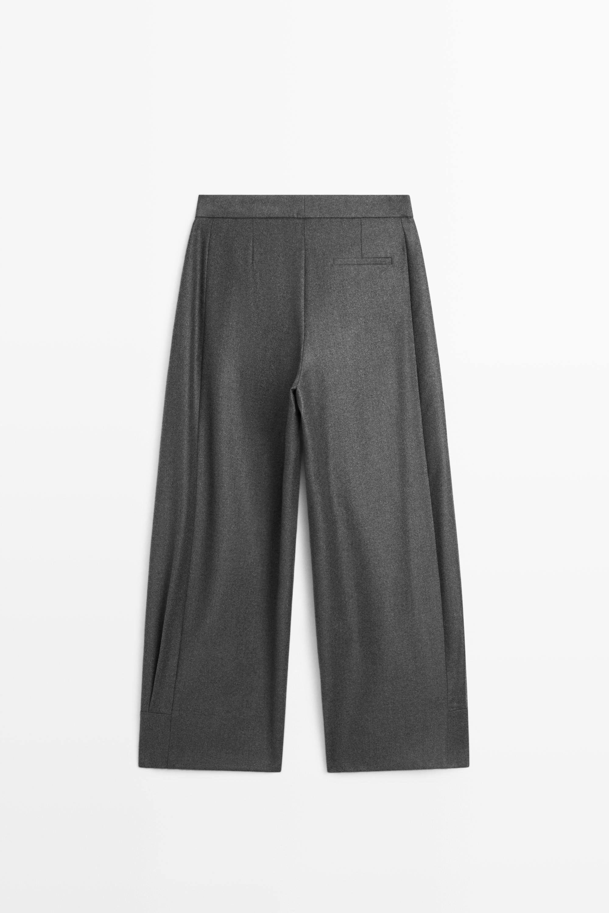 Pantalon 100 % laine détail bouton bas